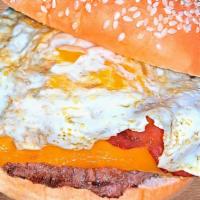 Sunrise Burger · Beef patty, bacon, fried egg, cheddar.