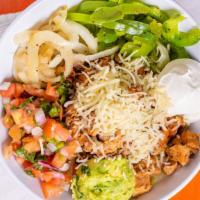 Fajita Salad · Grilled peppers and onions, shredded cheese, pico de gallo, guacamole, sour cream and your c...