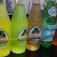 Jarritos Mexican Soda · 12.5 fl. oz. bottle. Choose from 4 flavors! Lime, mandarin, tamarind & pineapple.