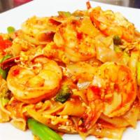 Drunken Noodles · Thai style noodles made with tomato basil sauce with large rice noodles, eggs, broccoli, & o...