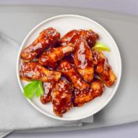 Bussin Bbq Wings · Fresh chicken wings breaded, fried until golden brown, and tossed in barbecue sauce. Served ...