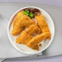 Classic Crispy Tenders · Chicken tenders breaded and fried until golden brown.
