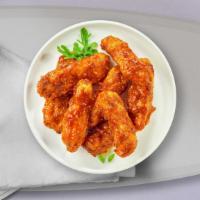 Bussin Bbq Tenders · Chicken tenders breaded and fried until golden brown before being tossed in barbecue sauce.
