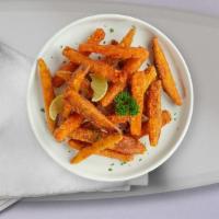 Sweet Potato Fries · (Vegetarian) Sweet potato fries cooked until golden brown.