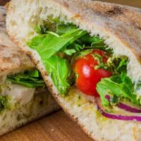 Chicken Pesto Sandwich · Chicken, arugula, cherry tomatoes, red onions and pesto