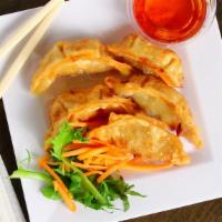 Fried Pork Dumplings (4) · Pork dumplings deep fried and served ginger soy