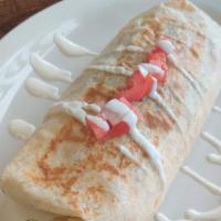 Monster Burrito · Rolled flour tortilla stuffed with your choice of meat (steak, chicken, carnitas (pork), pas...