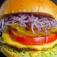 Cheeseburger · 7 oz. 3 blend beef patty, lettuce, tomato, red onions, pickles, and american cheese.