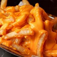 Cheese Fries · Hand-cut fries, cheddar sauce.