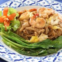 Pad See Ew · A house favorite! Flat, wide rice noodles stir-fried with scrambled eggs, fresh broccoli and...