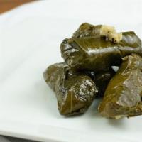 Grape Leaves (6) · Stuffed grape leaves with rice.
