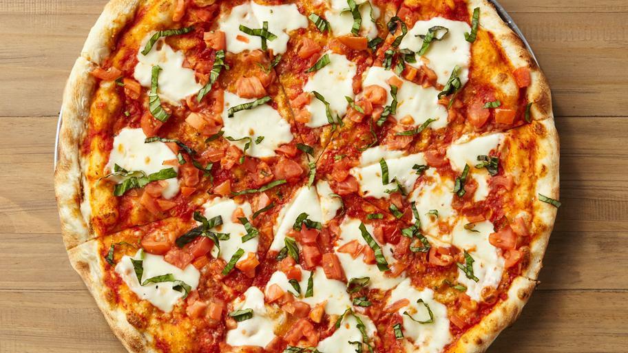 Margherita Pizza · 210 280 cal per slice. Olive oil base topped with sliced tomatoes. fresh basil, fresh garlic and fresh mozzarella.