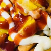 Salchipapas · Dish of cut-up fried hot dogs and French fries served with your favorite sauces.
