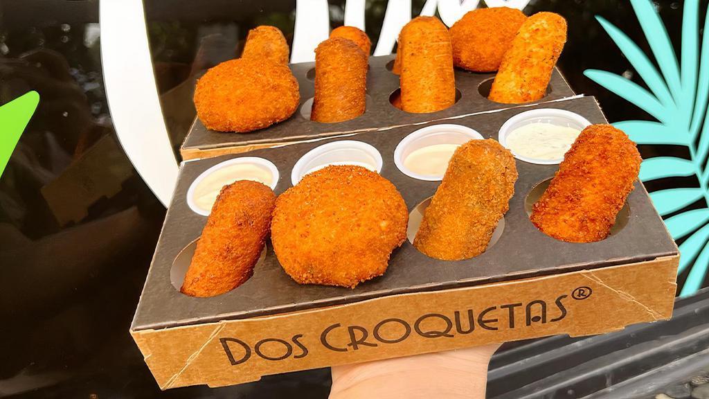 12 | Croqueta Flight™ + Sauces · Mix and match 12 craft croquetas & sauces with your very own Croqueta Flight™. If you’re doubling up let us know which croquetas you'd like in the special instructions box below!