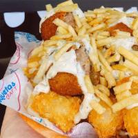 Croq N' Tots · Seasoned tater tots loaded with two of your favorite croquetas, cheese, sauce and papitas! #...
