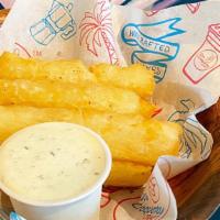 Seasoned Yucca Fries · Crispy Yucca Fries paired with our house made Verde sauce