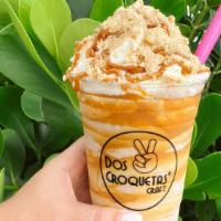 Nutella Shake · Nutella, topped with house made whipped cream, Dulce de Leche drizzle, Maria cookie crumbs