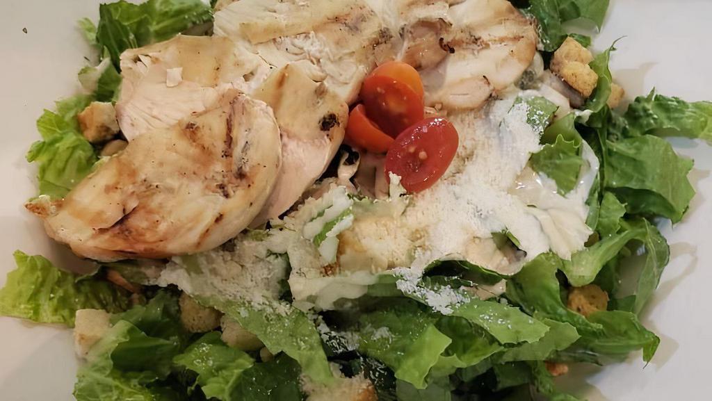 Chicken Caesar Salad · romaine lettuce, croutons, caesar dressing & grill chicken breast.