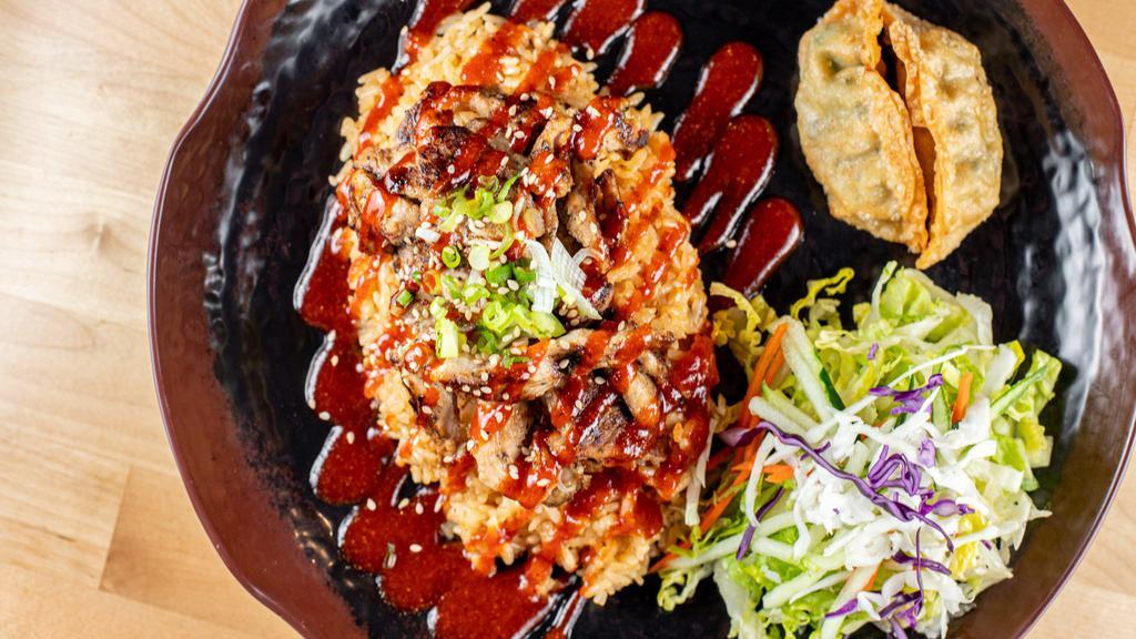 Chicken Kimchi Rice · Grilled chicken marinated in soy sauce. Kimchi, onion, green onion, sesame and blossom tree BBQ sauce. Served with your choice of two sides.