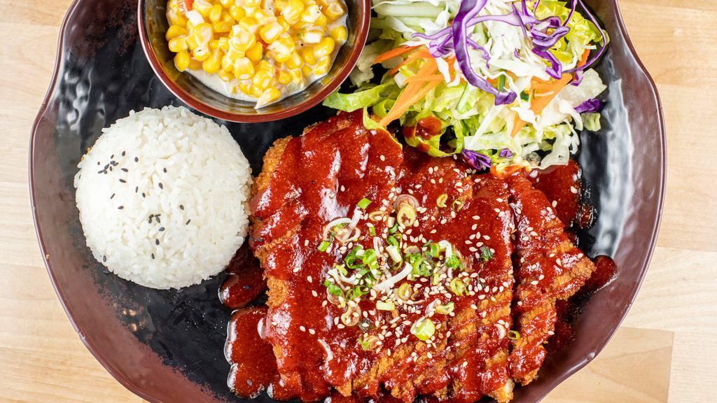 Crispy Chicken Rice · Crispy fried chicken cutlet with home-made blossom tree BBQ sauce, sesame and green onion. Served with steamed rice with your choice of two sides.