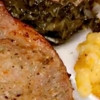 Steak Meal · Juicy grilled steak over seasoned yellow rice and sided with collard greens (with smoked tur...