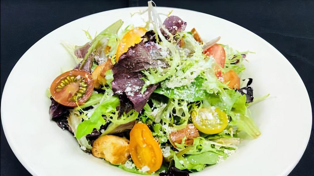 Simple Salad · 230 cal. Organic baby greens, heirloom tomatoes, garlic croutons, parmesan cheese, dijon balsamic vinaigrette.