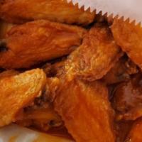 10 Wings · 10 wings tossed in your favorite sauce, served with celery & carrots and your choice of blue...