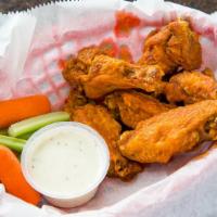 6 Wings · 6 wings served with celery carrots and your choice of dressing.