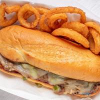 Beef Philly & Fry · Beef philly on a hoagie roll with onions, green peppers, and provolone cheese.