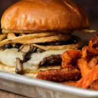Truffle Burger · CERTIFIED ANGUS BEEF STEAKBURGER + MELTED SWISS CHEESE + GRILLED MUSHROOMS + ONION STRINGS +...
