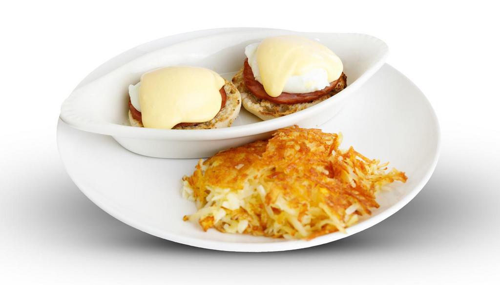 Eggs Benedict · Grilled Canadian bacon, 2 poached eggs and our house Hollandaise.