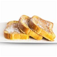 French Toast · 3 slices of Challah bread dipped in egg batter with touch of almond essence.