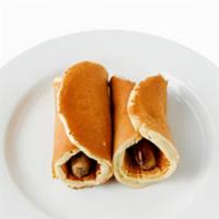 Two Little Pigs In A Blanket · Link sausage rolled in buttermilk pancakes.
