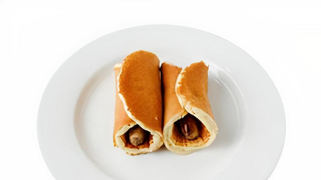 Two Little Pigs In A Blanket · Link sausage rolled in buttermilk pancakes.