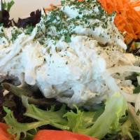 Tuna Salad · Tuna salad, mixed greens, tomato, onions, carrot, cucumber, boiled egg, black olives