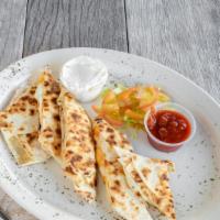Chicken Quesadilla · A grilled flour tortilla filled with chicken & melted cheese served with Salsa and Sour Cream