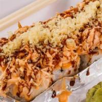 Volcano Roll · California roll topped with baked krabmeat, spicy mayo, eel sauce, crunchy flakes and fully ...