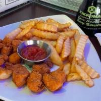 Kids Chicken Nuggets · Served with french fries and ketchup.