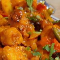 Aloo Gobi · Mixed vegetable and cheeseballs served in butter sauce.
