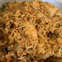 Shrimp Biryani · Spiced basmati rice cooed with shrimp
