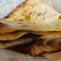 Aloo Paratha · Indian flatbread stuffed with a spiced mixture of potatoes.