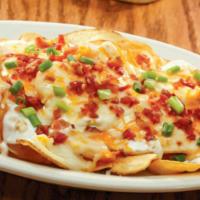 Steel Town Spuds · Topped with ranch dressing, bacon & melted cheese. Choose big fat fries, house chips, or tat...