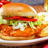 Drew'S Fried Chicken Sandwich · Fried chicken sandwich served with our secret sauce, lettuce, tomato, and pickles.