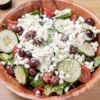 Small Greek Salad · Mixed Greens, Tomatoes, Kalamata Olives, Onions, Cucumbers, Feta Cheese Banana Peppers, And ...