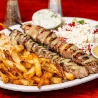 Filet Mignon Platter · Naked souvlaki platter.
2 Filet Mignon skewers cooked to perfection served with greek salad ...