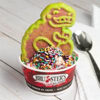 Dino Sundae · Vanilla ice cream covered in chocolate syrup, sprinkles, and our signature dino cookie!
