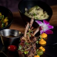 Lamb Lollipops · 4 Lollipops Served with Home-Made Au Jus Sauce (Garnished w/ carrots puree) Served w/ Two Si...
