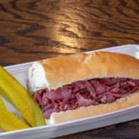 Pastrami Hoagie · Hot pastrami with your choice of melted cheese, mustard and pickles on a freshly baked hoagi...