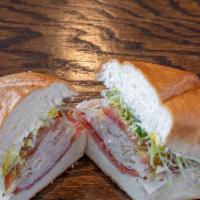 Italian Turkey Hoagie · Sliced turkey with roasted red peppers, and melted mozzarella on a freshly baked hoagie roll!