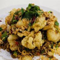 Fried Chinese Cauliflower · Spicy. Flowering cauliflower, Sichuan spices, dried chili peppers and cilantro.